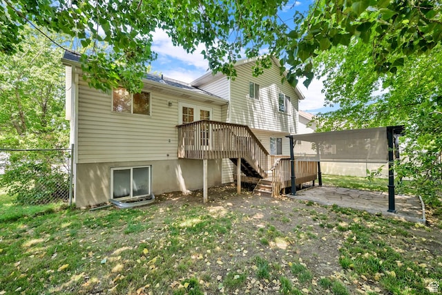 4188 S 2725 W, Roy, UT 84067 - rear view of property featuring stairway, a patio area, and a wooden deck