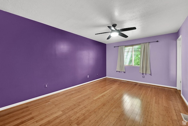 4188 S 2725 W, Roy, UT 84067 - empty room featuring a ceiling fan, a textured ceiling, and hardwood / wood-style floors