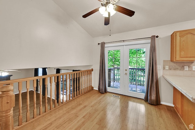 4188 S 2725 W, Roy, UT 84067 - interior space featuring a ceiling fan, vaulted ceiling, and light wood-type flooring