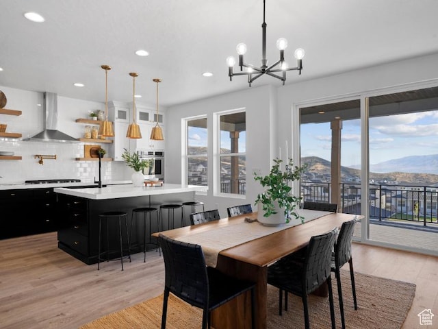 5885 N Canyon Rim Rd Unit 624, Lehi, UT 84043 - dining space with a mountain view, light wood-type flooring, recessed lighting, and a chandelier