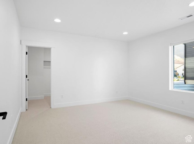 5885 N Canyon Rim Rd Unit 624, Lehi, UT 84043 - spare room featuring light colored carpet and recessed lighting