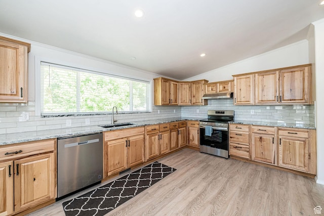 432 E 2700 N, North Ogden, UT 84414 - kitchen featuring appliances with stainless steel finishes, under cabinet range hood, lofted ceiling, crown molding, and backsplash