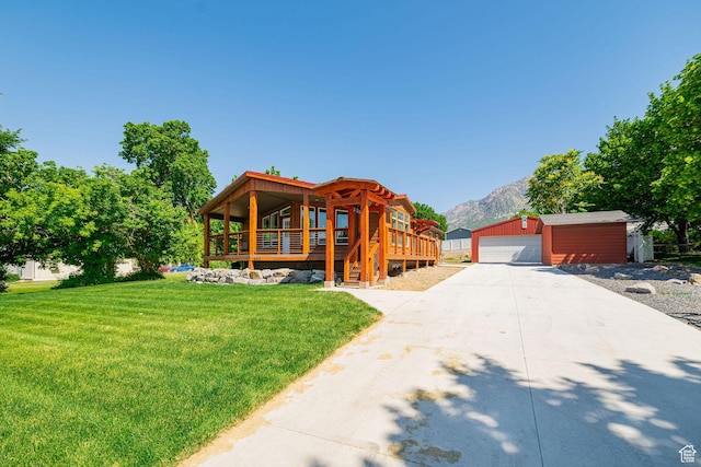 432 E 2700 N, North Ogden, UT 84414 - log-style house with an outbuilding, a front yard, a garage, and a mountain view
