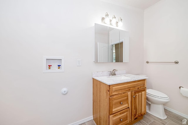 432 E 2700 N, North Ogden, UT 84414 - bathroom featuring vanity, ornamental molding, and wood finished floors