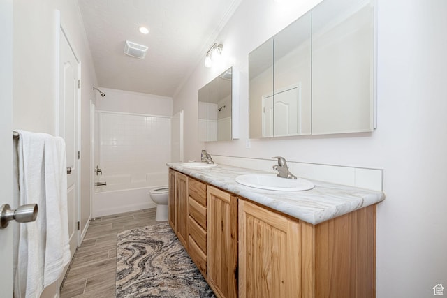 432 E 2700 N, North Ogden, UT 84414 - full bathroom with double vanity, wood finished floors, and washtub / shower combination