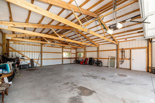 432 E 2700 N, North Ogden, UT 84414 - garage featuring a garage door opener and metal wall