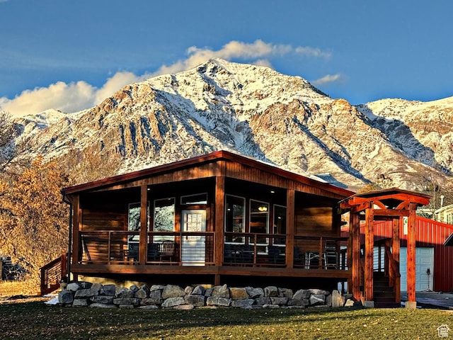 432 E 2700 N, North Ogden, UT 84414 - back of house featuring a mountain view and a garage