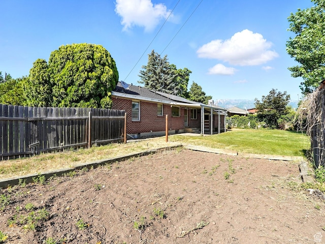 1951 W 4900 S, Roy, UT 84067 - fenced yard featuring a patio