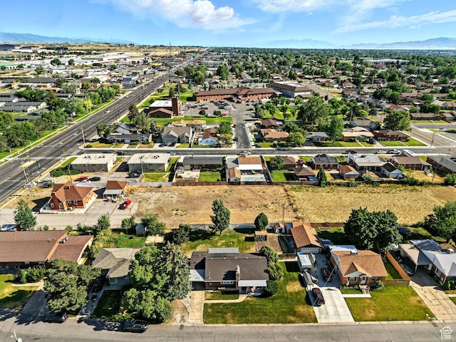 1951 W 4900 S, Roy, UT 84067 - aerial view of property and surrounding area with nearby suburban area and a mountainous background
