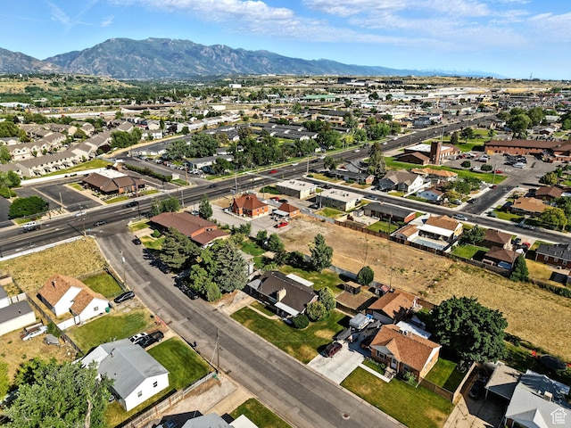 1951 W 4900 S, Roy, UT 84067 - aerial view of property and surrounding area featuring nearby suburban area and a mountainous background