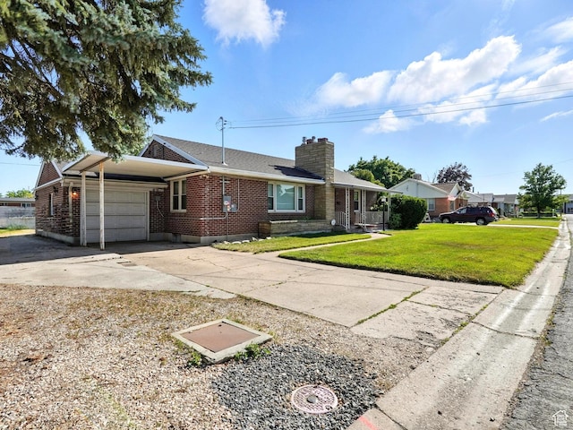 1951 W 4900 S, Roy, UT 84067 - view of side of property featuring an attached garage, brick siding, a chimney, and driveway