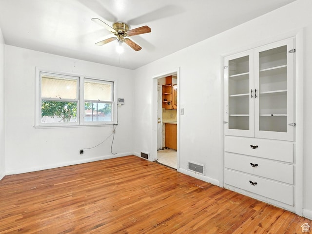 1951 W 4900 S, Roy, UT 84067 - unfurnished bedroom featuring light wood finished floors and baseboards