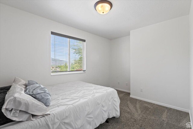 3186 N 1175 E, Layton, UT 84040 - carpeted bedroom featuring baseboards