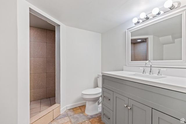 680 E 2800 N, North Ogden, UT 84414 - full bath featuring stone tile flooring, vanity, and a tile shower