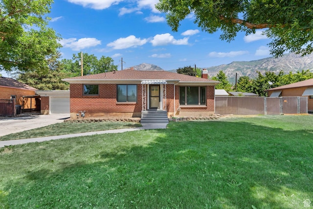 680 E 2800 N, North Ogden, UT 84414 - view of front of property with brick siding, a mountain view, a chimney, and a garage
