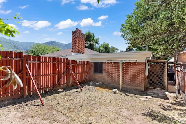 680 E 2800 N, North Ogden, UT 84414 - view of yard with a mountain view and a gate