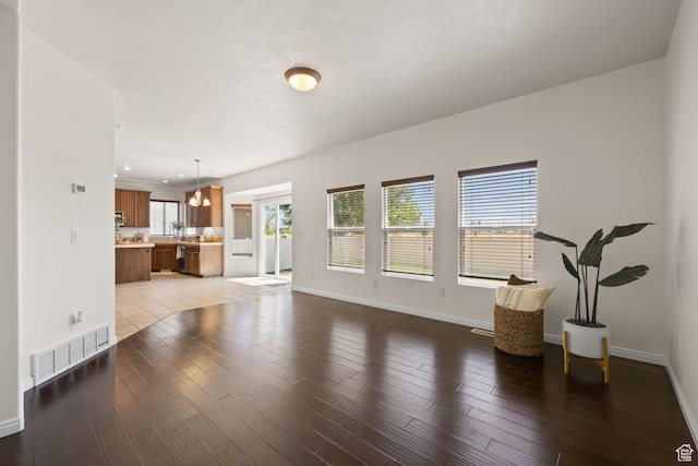 3991 W Hollandia Ln, West Jordan, UT 84084 - living room featuring light wood finished floors