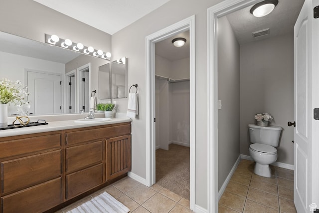 3991 W Hollandia Ln, West Jordan, UT 84084 - full bathroom with tile patterned flooring, vanity, and a spacious closet