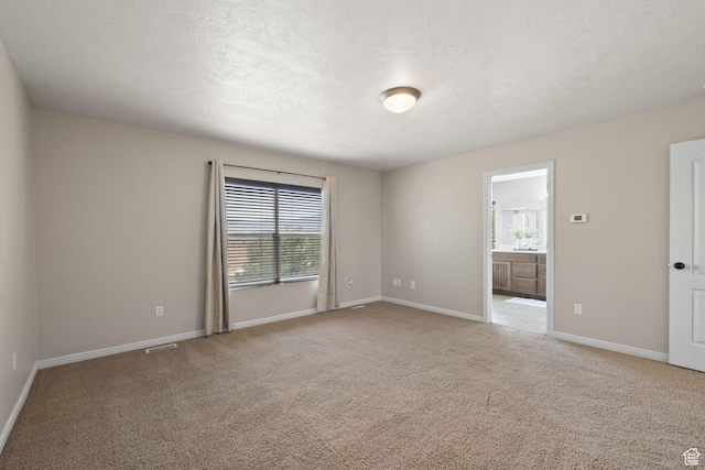 3991 W Hollandia Ln, West Jordan, UT 84084 - spare room with healthy amount of natural light, light colored carpet, and a textured ceiling
