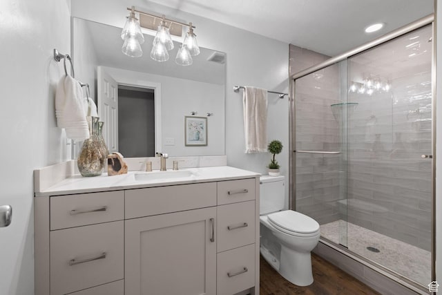 3991 W Hollandia Ln, West Jordan, UT 84084 - bathroom featuring a stall shower, vanity, and wood finished floors