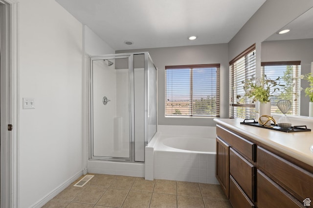 3991 W Hollandia Ln, West Jordan, UT 84084 - bathroom featuring a stall shower, a bath, tile patterned floors, vanity, and recessed lighting