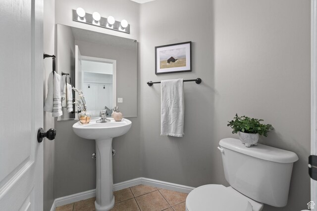 3991 W Hollandia Ln, West Jordan, UT 84084 - half bathroom featuring toilet and tile patterned flooring