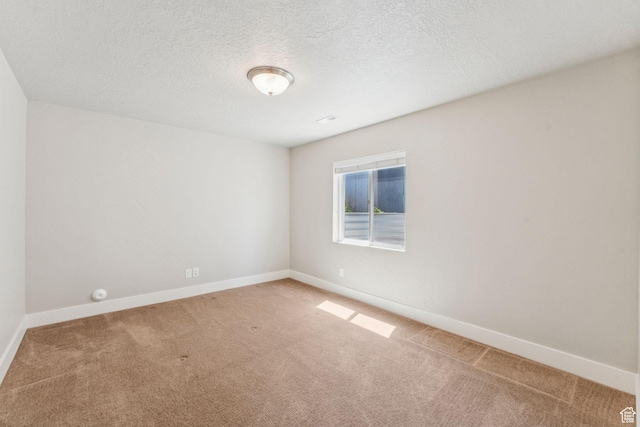 11103 S Kiwano Way W, South Jordan, UT 84009 - carpeted empty room with baseboards and a textured ceiling