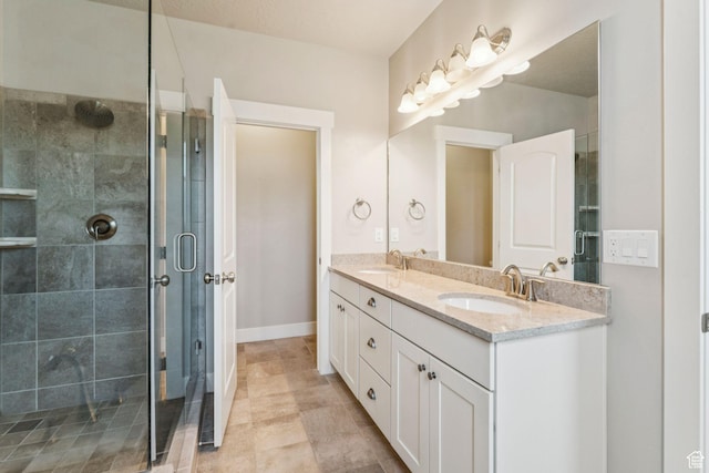 11103 S Kiwano Way W, South Jordan, UT 84009 - bathroom with double vanity and a stall shower