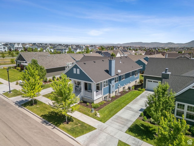 11103 S Kiwano Way W, South Jordan, UT 84009 - aerial view of residential area with a mountain backdrop