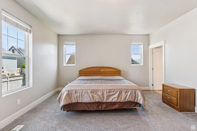 11103 S Kiwano Way W, South Jordan, UT 84009 - carpeted bedroom featuring baseboards and a textured ceiling