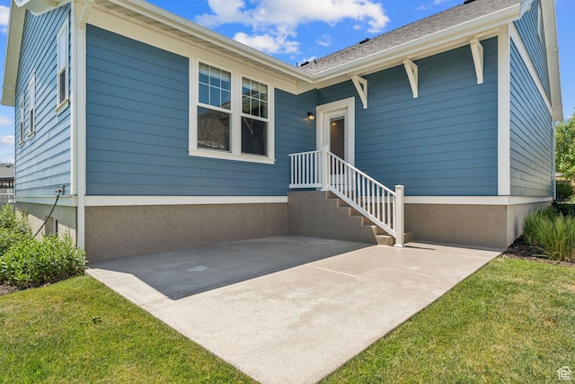 11103 S Kiwano Way W, South Jordan, UT 84009 - view of front of house featuring a patio area and a front lawn
