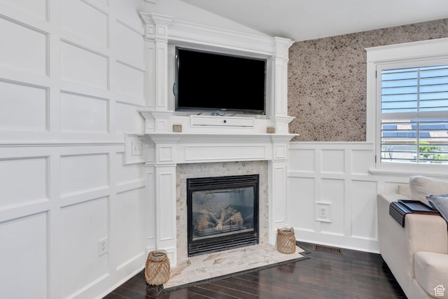 914 W Red Fox Ln, Saratoga Springs, UT 84045 - detailed view of a decorative wall, wood finished floors, wainscoting, a fireplace with flush hearth, and wallpapered walls