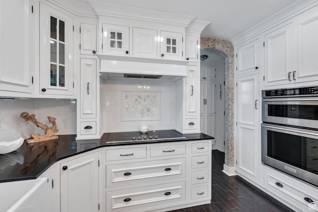 914 W Red Fox Ln, Saratoga Springs, UT 84045 - kitchen with black electric cooktop, stainless steel double oven, white cabinets, and dark countertops