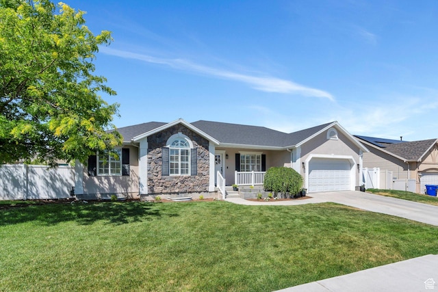 914 W Red Fox Ln, Saratoga Springs, UT 84045 - ranch-style house with driveway, a porch, a garage, stone siding, and stucco siding
