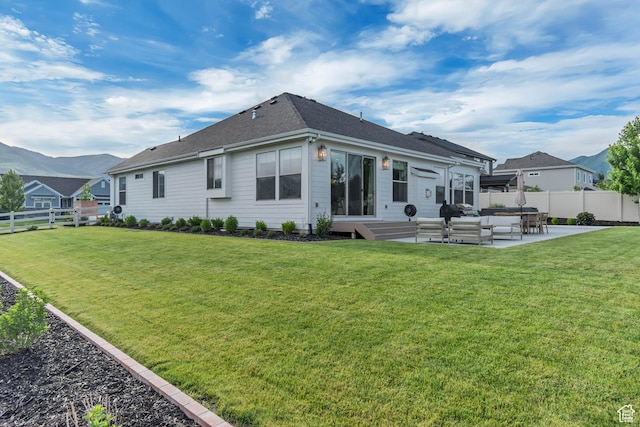 387 S 300 E, Midway, UT 84049 - rear view of house with a patio, outdoor lounge area, roof with shingles, and a mountain view