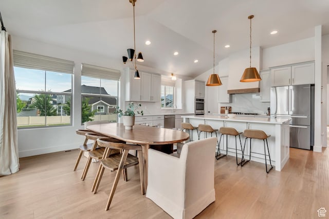 387 S 300 E, Midway, UT 84049 - dining space with lofted ceiling, light wood-style floors, and recessed lighting