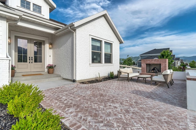 387 S 300 E, Midway, UT 84049 - view of patio with french doors and an outdoor brick fireplace