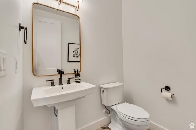 387 S 300 E, Midway, UT 84049 - half bathroom featuring baseboards and toilet