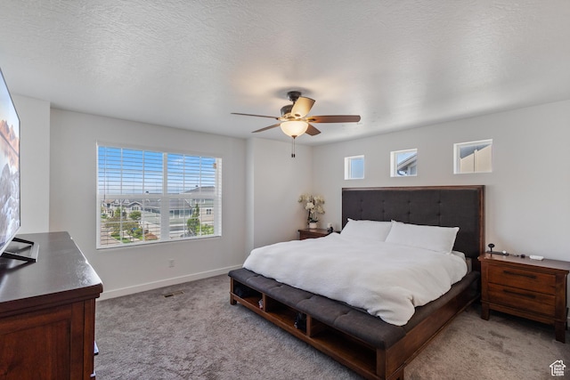 5680 W Pelican Ridge Ln, Salt Lake City, UT 84118 - bedroom with light colored carpet, multiple windows, and ceiling fan