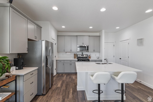 5680 W Pelican Ridge Ln, Salt Lake City, UT 84118 - kitchen with gray cabinetry, stainless steel appliances, and recessed lighting