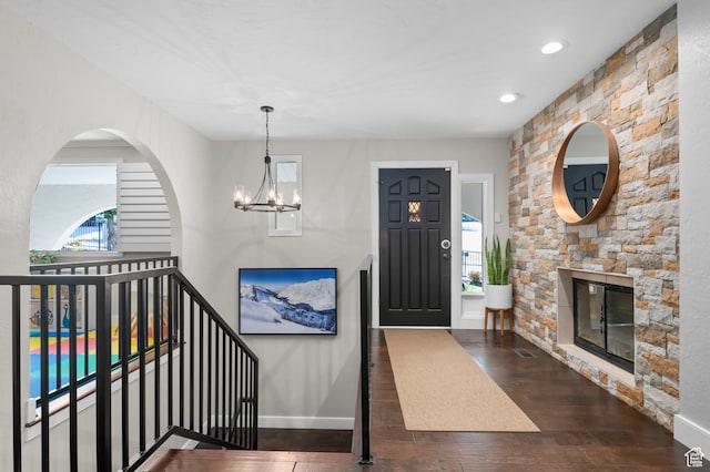 7968 S Titian St E, Cottonwood Heights, UT 84121 - foyer entrance with hardwood / wood-style flooring, a chandelier, recessed lighting, and a fireplace