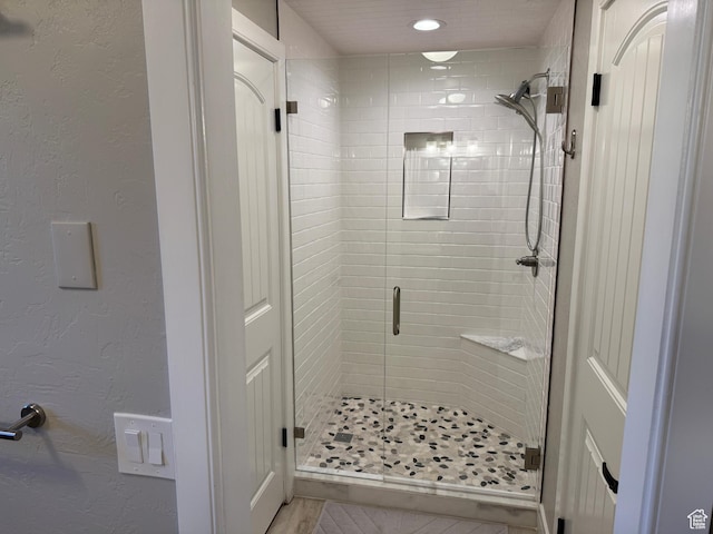 7968 S Titian St E, Cottonwood Heights, UT 84121 - full bathroom with a shower stall, a textured wall, and recessed lighting