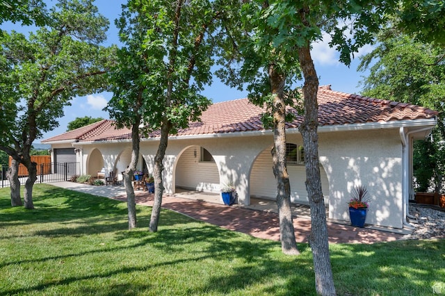 7968 S Titian St E, Cottonwood Heights, UT 84121 - back of property featuring stucco siding, an attached garage, and a tile roof