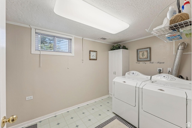 1492 S 2100 E, Salt Lake City, UT 84108 - laundry area featuring cabinet space, a textured ceiling, washer and clothes dryer, and crown molding