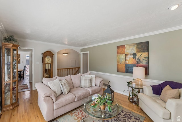 1492 S 2100 E, Salt Lake City, UT 84108 - living room with light wood-style floors, ornamental molding, and arched walkways