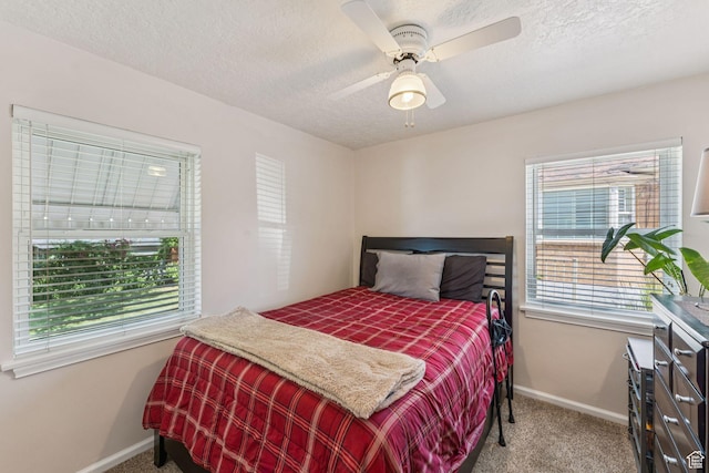 1492 S 2100 E, Salt Lake City, UT 84108 - bedroom featuring carpet, multiple windows, a textured ceiling, and a ceiling fan