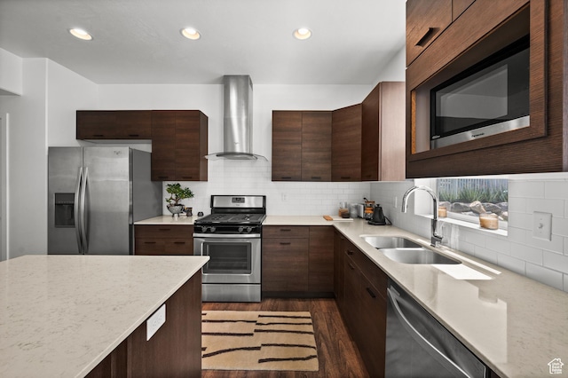 1578 E Maple Way, Layton, UT 84040 - kitchen with appliances with stainless steel finishes, wall chimney range hood, dark wood-type flooring, tasteful backsplash, and dark brown cabinets
