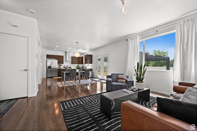 1578 E Maple Way, Layton, UT 84040 - living area with dark wood finished floors, healthy amount of natural light, french doors, and recessed lighting