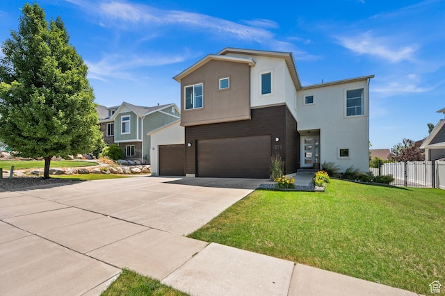 1578 E Maple Way, Layton, UT 84040 - view of front of property featuring driveway, an attached garage, and stucco siding