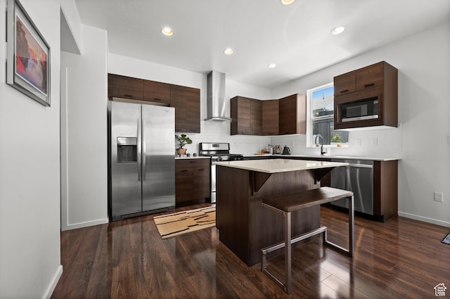 1578 E Maple Way, Layton, UT 84040 - kitchen featuring stainless steel appliances, wall chimney range hood, modern cabinets, a kitchen breakfast bar, and recessed lighting